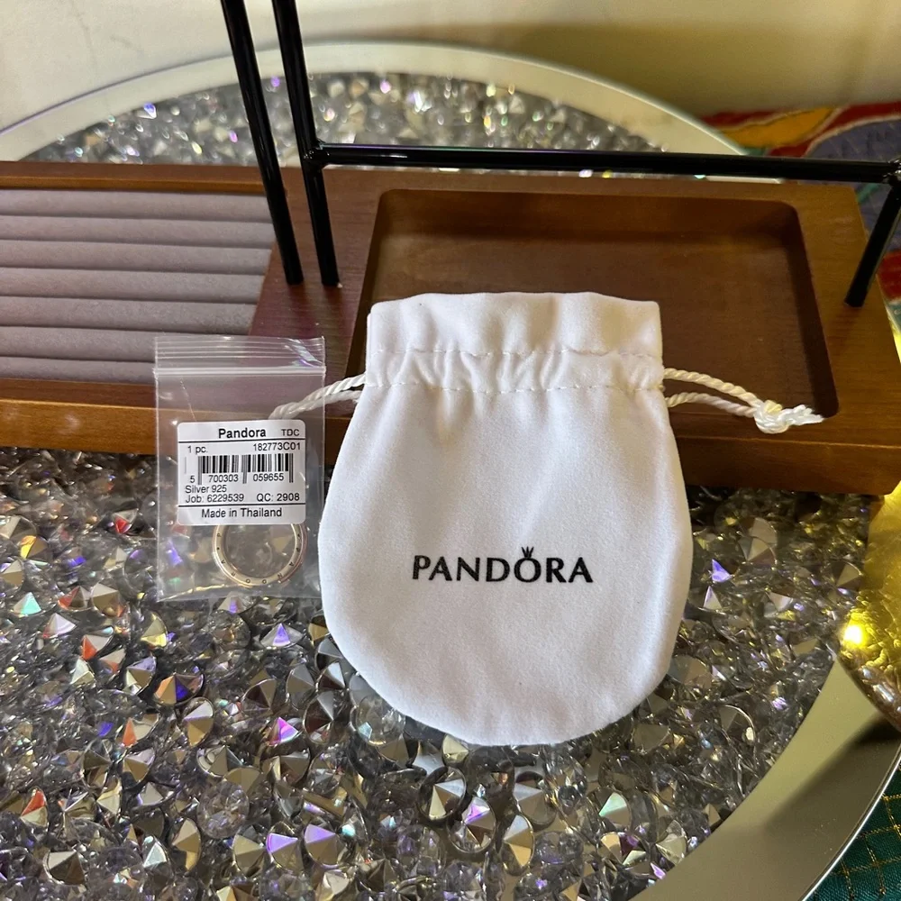 NWT - Pandora Signature Two Tone Logo & Pave Ring. Retail $135.00. Size 6.5